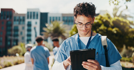 Happy man, internship and medical student with tablet for research, med school or online course at campus. Male person, trainee or junior candidate with smile on technology for health study or app
