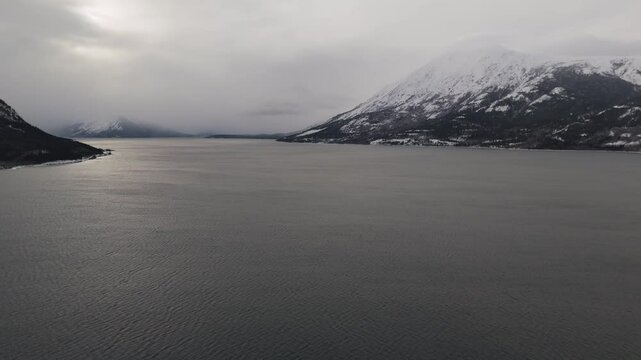 Overcast Sky During Winter Over Bennett Lake In Carcross, Yukon, Canada. Wide Shot