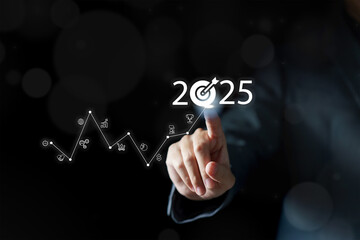 The 2025 new year business goals concept. Businessman touching increase arrow graph company future growth 2025. Business plan target strategy, Planning and challenge business strategy in new year,