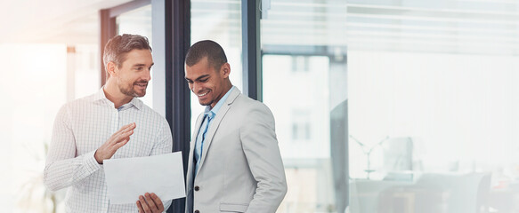 Fototapeta premium Banner, businessmen and document for review, collaboration and advice as feedback in office. Male people, paperwork and discussion with teamwork, lens flare and conversation as leadership for company