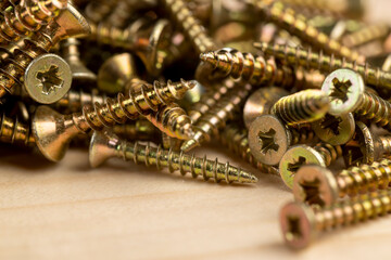 yellow metal self-tapping screws for fixing wooden boards and other wood products