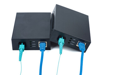 Fiber optic Media converter with Fiber optic cable isolated on white background
