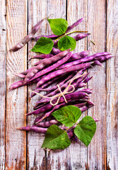 raw bean on light wooden table