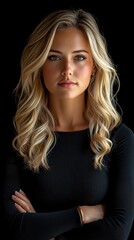 Naklejka premium A woman with blonde hair and a black shirt is standing with her arms crossed