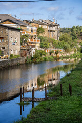 Fototapeta premium Typical houses along the Onor River, Rio de Onor town, municipality of Braganza, Trás-os-Montes and Alto Douro, Portugal
