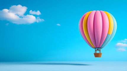 Fototapeta premium Colorful hot air balloon soaring in a clear blue sky with fluffy white clouds, symbolizing freedom, adventure, and travel dreams while casting a soft shadow on the ground below.