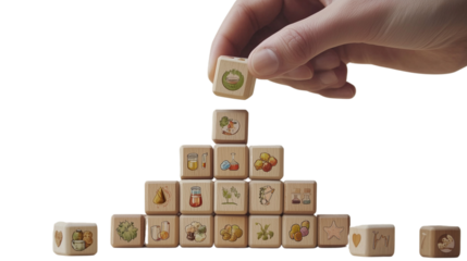 A hand is placing health and medical icon wooden blocks in the shape of an open pyramid, on a transparent backgrounds