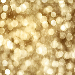 Obraz premium Golden bokeh effect creating a dreamy and festive background with a warm glow, ideal for holiday themes and adding a magical atmosphere to designs.