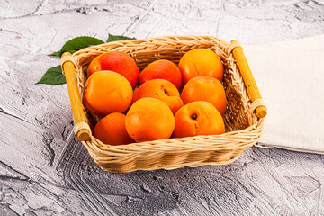 Raw ripe sweet apricots heap