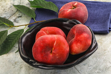 Ripe sweet and juicy Flat peach