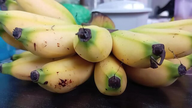  Musa acuminata or lady finger banana ,Musa acuminata bananas close up photo on a table. photo taken in malaysia