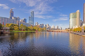 Fototapeta premium Yarra River and Melbourne skyline, blending architecture and nature in harmony