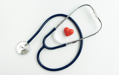 Stethoscope and heart on white background, Close up.