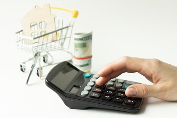 family budget planning - man counting and checking household daily expenses