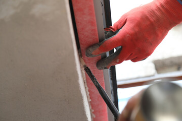 installation of a remote window in the warm contour of the building, foaming