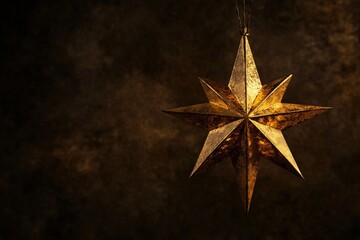 golden star ornament on a dark background