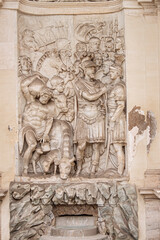Obraz premium Statues of The Fountain of Moses or Fontana dell'Acqua Felice, built in 1588 by Domenico Fontana a blind triumphal arch with three niches. In the central niche stands the statue of Moses, Rome, 2017