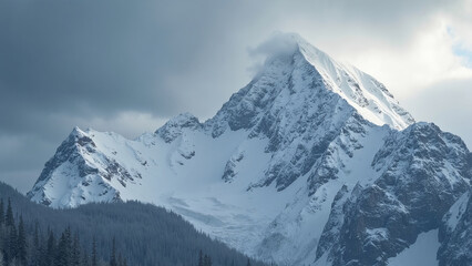 Obraz premium Majestic Snow-Capped Mountain Under a Dramatic Sky