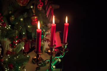 Rite with a burning candle, night mystery atmosphere, Christmas eve, Yule or another day