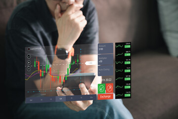 Hand of the trader showing a growing virtual hologram stock on smartphone, planning and strategy, Stock market, Business growth, progress or success concept. invest in trading..