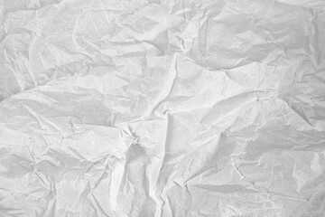 Crumpled white paper texture, abstract background.