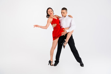 Full length photo of tempting married couple dressed classic clothes enjoying samba dance empty...