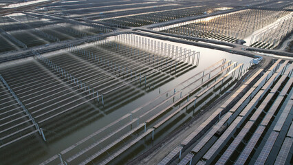 Fototapeta premium Drones capture on-site construction of photovoltaic panels