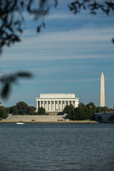 Lincoln Memorial and Washington Monument in Washington, DC, USA, on a sunny Summer Day with blue Sky - seen from the Potomac River