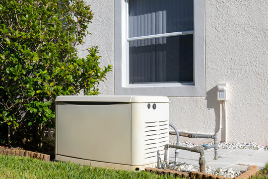 Home electric power generator on the side of house for use of emergency power outage