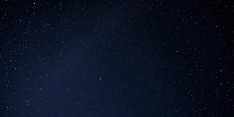 Naklejka premium Starry night sky filled with bright twinkling stars, dark, sky