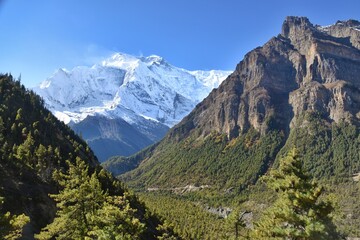 Fototapeta premium Snow-capped Himalayan mountain tops and glaciar peaks in Nepal