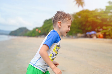 kids in Santa hat on the beach