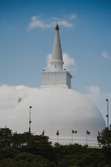 Ruwanwelisaya stupa gleaming under blue sky in anuradhapura, sri lanka