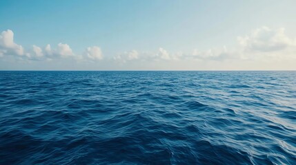 Obraz premium Serene ocean view under a clear blue sky.