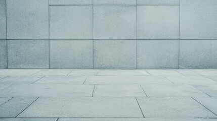 A minimalist concrete wall with a flat surface, evoking a sense of simplicity and space.