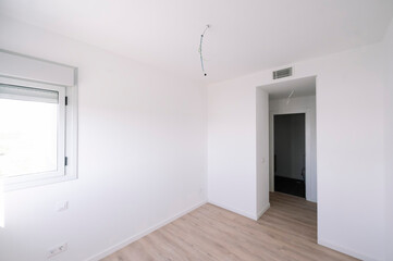 Obraz premium Empty and bright apartment, new wooden floors, modern.
