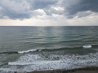 Fototapeta premium sea ​​cloudy calm sea foam