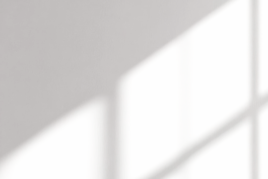 An abstract composition of soft light and shadow, evoking a sense of calm and introspection in a space.