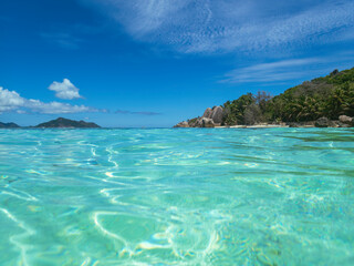 Enjoying The Crystal Clear Water At The Beach