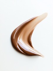 beautiful long swatch of glossy foundation on a white background close up 
