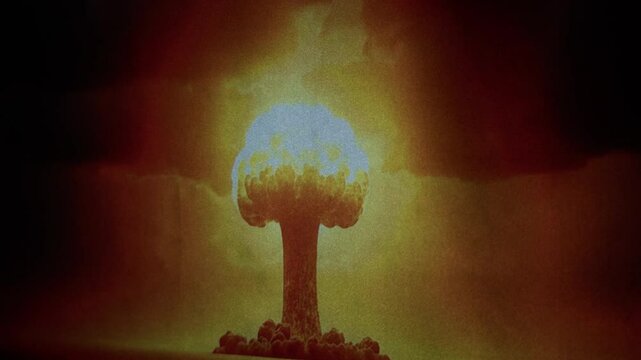 No people shot of vivid nuclear explosion graphic projection on stark black background