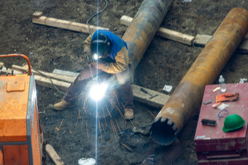 Men Welding Pipe-01