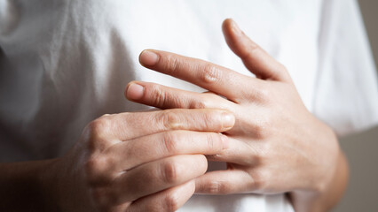 Health care and medical concept, rheumatism woman hand pain from cramp, trigger finger, wrist pain...