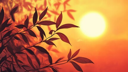 Silhouette of leaf branch against vibrant sunset with warm colors creating a serene and calming atmosphere in nature.