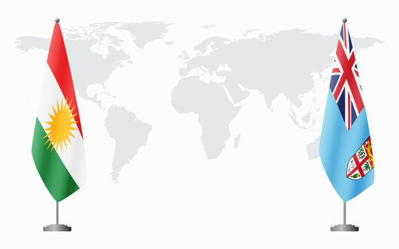 Kurdistan and Fiji flags for official meeting against background of world map.