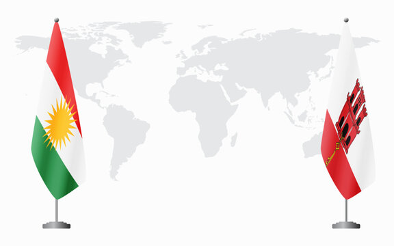 Kurdistan and Gibraltar flags for official meeting against background of world map.