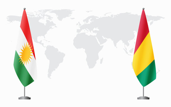 Kurdistan and Guinea flags for official meeting against background of world map.