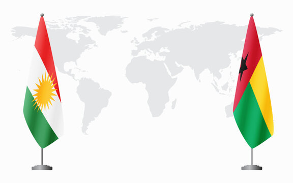 Kurdistan and Guinea Bissau flags for official meeting against background of world map.