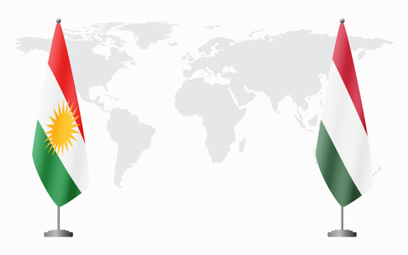 Kurdistan and Hungary flags for official meeting against background of world map.