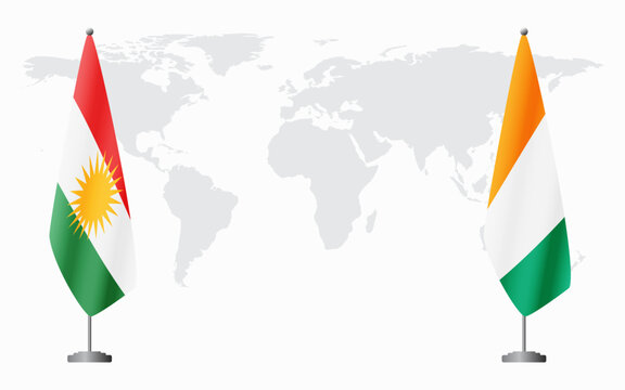 Kurdistan and Ivory Coast flags for official meeting against background of world map.